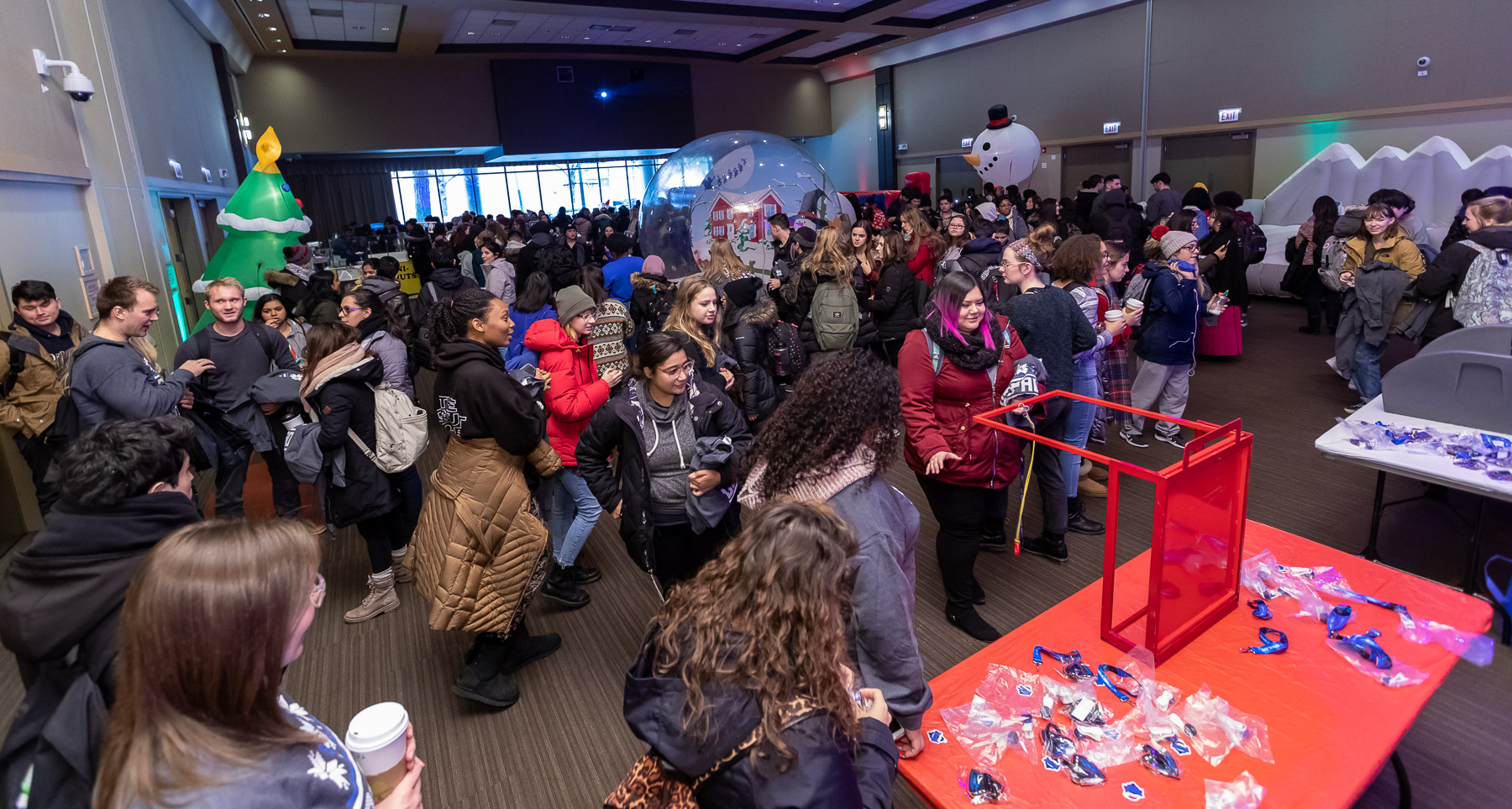DePaul students take part in the many available crafts, games and activities during the second-annual Ugly Sweater Party in the Lincoln Park Student Center. (DePaul University/Jeff Carrion)